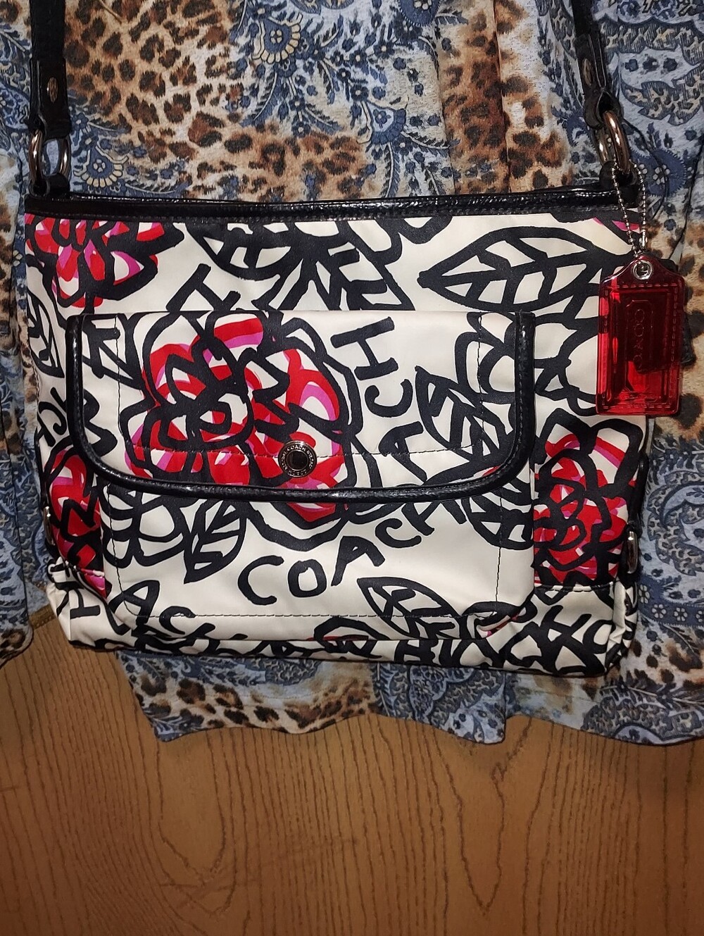 COACH White Crossbody Bag with Red Floral & Black Graphic Trim